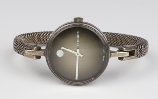 A lady's silver cased circular wristwatch with mechanical movement in a 26mm case, on a ditto strap, stamped 800 