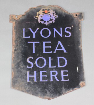 A "Lyons' Tea Sold Here" double sided, shield shaped, black and blue enamelled advertising sign 58cm h x 46cm w 