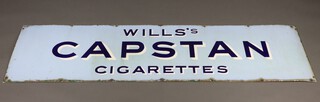 A "Wills's Capstan Cigarettes" rectangular white and blue enamelled advertising sign 46cm h x 183cm w 