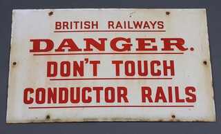 Of railway interest, a British Railways white and red enamelled sign "British Railways Danger.  Don't Touch Conductor Rails." 32cm x 51cm 