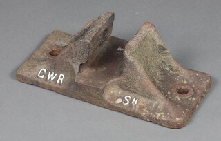 Of railway interest, A Great Western Railway rail shoe/rail chair, marked GWR 1902 14cm x 39cm x 19cm 