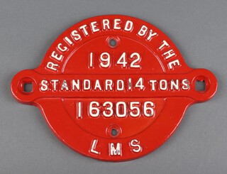 Of railway interest, a red  and white painted  LMS wagon registration plate marked " Registered By The LMS, 1942 Standard 14 Tons 1 63056" 17cm x 23cm 