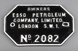 Esso, a black and white painted octagonal wagon plate marked "Owners Esso Petroleum Company, Limited, London S.W.1. No. 2082" 14cm x 23cm 