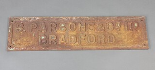 A rectangular cast iron sign "S. Parsons & Co. Ltd. Bradford" 24cm x 90cm 