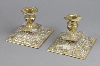 A pair of Victorian square cast brass candlesticks with detachable sconces 9cm h x 10cm w x 10cm d 