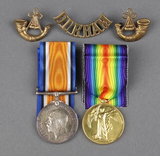 A British War medal and Victory medal to 37707 Pte. F. Brockbank Durham Light Infantry comprising British War medal and Victory medal, brass shoulder title and 2 collar dogs 