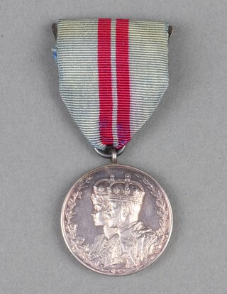 A George V Coronation medal, un-named, as issued 