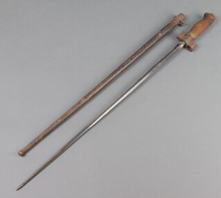 A First World War French Rosalie bayonet complete with scabbard (scabbard is rusted) 