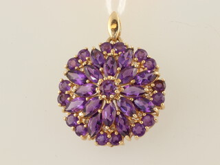 A 10ct yellow gold amethyst pendant, 4.9 grams, 30mm 