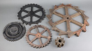 A 6 spoked wooden cog gear 44cm, 2 others 29cm and 25cm, 2 other gear wheels 22cm and 9cm 