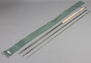 A Hardy Graphite 3 piece, 15'4" fishing rod with 10 line weight, contained in a green cloth bag