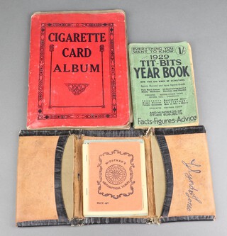 A collection of cigarette cards including Players Cricketers contained in a small album, 1 volume "1929 Tit-Bits" year book, a leather wallet containing Wichtmans Arithmetical tables and 2 ration books