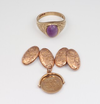 A pair of 9ct yellow gold cufflinks, a charm and an amethyst set ring size M, gross weight 6.3 grams