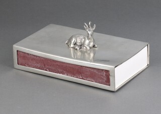 A large pewter table match box holder surmounted by a figure of a goat, the base marked HWS-ZINN MUNICH 4cm h x 20cm w x 12cm d 