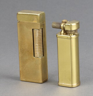 A gentleman's gold plated Dunhill cigarette lighter and a brass cigarette lighter