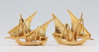 A pair of yellow gold, testing as 18ct, cufflinks in the form of Dhows, gross weight 11.5 grams 