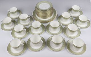 A Royal Doulton Sonnet design tea set comprising 14 tea cups (1 a/f), 17 saucers (4 seconds), 16 side plates (6 seconds), 4 serving plates (all seconds) 