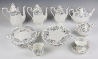 An extensive Royal Albert Silver Maple dinner, tea and coffee service comprising 22 dinner plates (1 a second), 7 tureens and covers (1 tureen a/f), 3 vegetable dishes,  5 milk jugs (1 a/f), cake stand (a/f), 2 tazzas (1 a second), teapot and lid, breakfast teapot and lid, 12 dessert bowls (1 a/f, 2 seconds), 12 soup bowls, 22 side plates, 32 tea cups (2 a/f), 33 saucers, 21 coffee cups (6 a/f), 22 saucers (1 a/f), 12 two handled soup cups (2 a/f), 12 large saucers (1 a/f), 8 cream jugs (1 a/f), 1 large coffee pot, 1 medium coffee pot, 1 small coffee pot, 6 small sugar bowls (2 a/f), 4 egg cups, 4 condiments, 5 sauce boats (1 a second and 2 a/f), 36 side plates, 2 fruit bowls, 3 oval bowls, 4 oval meat plates, 4 sandwich plates, 5 large saucers (1 a second), a preserve pot and cover (the cover a/f), 14 dishes various (3 a/f and 2 seconds), a butter dish and cover (cover a/f), 2 side bowls and a teapot stand 