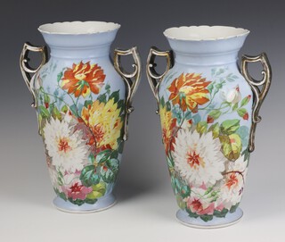 A pair of 19th Century Continental oviform twin handled vases decorated with flowers 38cm 