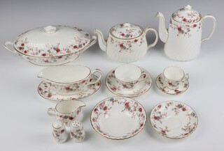 An extensive Minton Ancestral tea, coffee and dinner service comprising 4 coffee cups (1 a/f), 9 saucers, 20 tea cups (1 a/f), 11 saucers, 7 two handled bowls (1 a/f), 2 milk jugs, 1 cream jug, 2 sugar bowls (1 a/f), 2 tea pots, 1 coffee pot, 19 small plates, 12 medium plates, 15 dinner plates, 4 condiments, 15 large saucers (6 seconds), 6 fruit bowls, 7 soup bowls, 2 tureens and covers (1 cover a/f), sauce boat and stand, 3 serving plates, dish (spare coffee pot lid), coffee pot and 2 oval meat plates 