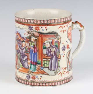 An 18th Century Chinese famille rose mug decorated with figures on a pavilion terrace with panels of birds and buildings, having a dragon handle 13.5cm  