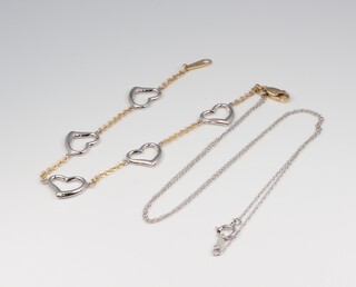 A 10k two colour gold heart bracelet, 2.1 grams 17cm and a 10k necklace 0.4 grams, 40cm 