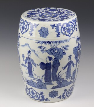 A modern Chinese blue and white garden seat with pierced decoration, decorated with figures in landscapes 45cm  