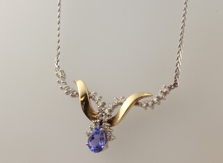 A 14ct white gold tanzanite and diamond necklace, the tanzanite 1.25ct, the brilliant cut diamonds 0.8ct, on a 14ct chain 42cm, 9.2 grams 