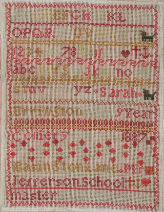 Victorian wool work sampler with alphabet and numbers, cats, anchors and hearts by Sarah Errington aged 9 years, Colliery School, Easington Lane, Jefferson School Master, dated 1887 42cm x 32cm 