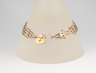 A 9ct yellow gold gate bracelet with heart padlock, 18cm,  6.8 grams 