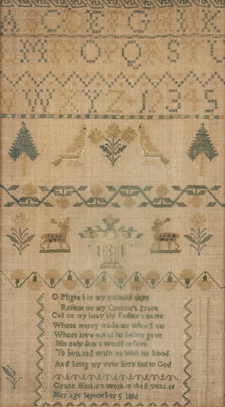 A 19th Century sampler, letters, numbers and verse by Grace Hoskins work in the 11th year of her age September 5th 1886 with trees, birds, flowers and deer 55cm x 31cm 