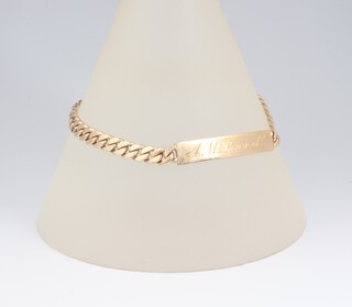 A 9ct yellow gold identity bracelet, engraved, 18cm, 10.5 grams 