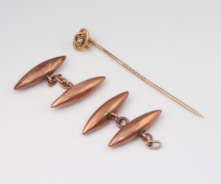 A pair of 9ct yellow gold cufflinks and an Edwardian 15ct gold tie pin, 3.4 grams 