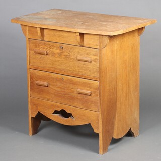 A Liberty style Arts and Crafts oak chest of 2 drawers with brass escutcheons 81cm h x 84cm w x 53cm d 