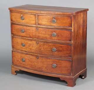 A 19th Century bleached mahogany bow front chest of 2 short and 3 long drawers with ring drop handles raised on bracket feet 99cm h x 104cm w x 53cm d 