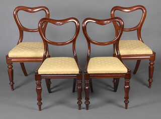 A harlequin set of 4 (2 pairs) Victorian mahogany spoon back dining chairs with upholstered drop in seats, raised on turned supports 