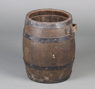 A coopered oak barrel 34cm h x 24cm diam. 