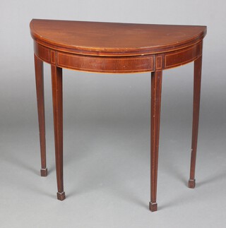 An Edwardian Georgian style crossbanded and inlaid mahogany demi-lune card table, 74cm h x 76cm w x 38cm d 