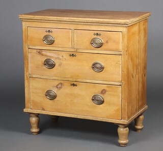 A Victorian pine chest of 2 short and 2 long drawers, raised on turned supports 85cm h x 78cm w x 45cm d 