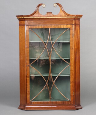 A Georgian inlaid mahogany hanging corner cabinet with broken pediment, fitted shelves enclosed by astragal glazed panelled doors 122cm h x 76cm w x 49cm d 