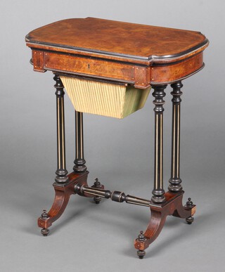 A Victorian quarter veneered figured walnut work table with hinged lid and deep basket, raised on turned and fluted supports with H framed stretcher 73cm h x 52cm w x 40cm d 