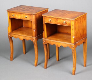 A pair of Georgian style walnut finished bedside cabinets fitted a drawer above recess on shaped supports, 48cm h x 44cm w x 32cm d 