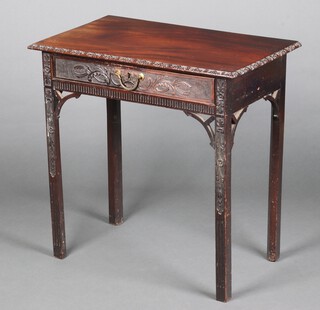 A 19th Century carved mahogany side table with blind fret work decoration, raised on square tapered supports 72cm h x 71cm w x 42cm d 