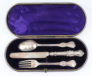 A Victorian cased silver christening set comprising spoon, fork and knife, London 1864 and 1867, 62 grams, in a fitted case 