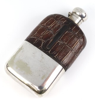 An Edwardian silver plated and leather mounted hip flask 18cm 