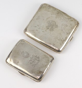 Two silver cigarette cases with engraved monograms Birmingham 1896 and London 1923, 188 grams gross