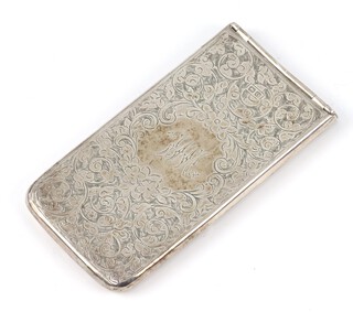 A Victorian engraved rectangular silver vesta with scroll ground and engraved armorial Chester 1879, with Needhams Patent. 8.5cm, 40 grams 