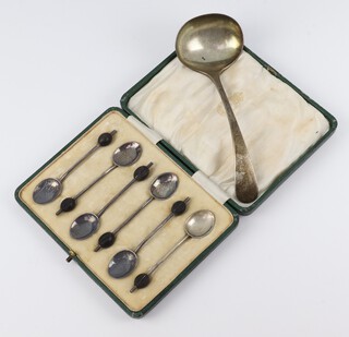 A silver sauce ladle Sheffield 1928 and a set of 6 silver bean end coffee spoons Birmingham 1913, gross weight 118 grams 