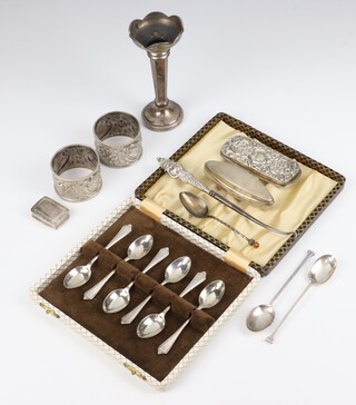 A set of 6 silver coffee spoons Sheffield 1947, 3 others, 2 napkin rings, spill vase, nail buffer, box, box lid and button hook, weighable silver 166 grams 