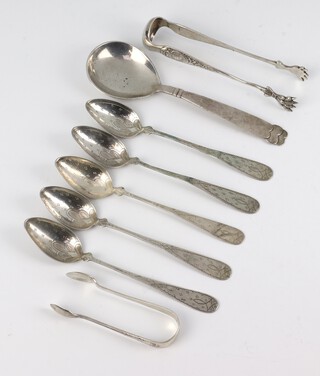 A pair of silver sugar nips, rubbed marks, smaller ditto and 6 Continental silver spoons, 118 grams 